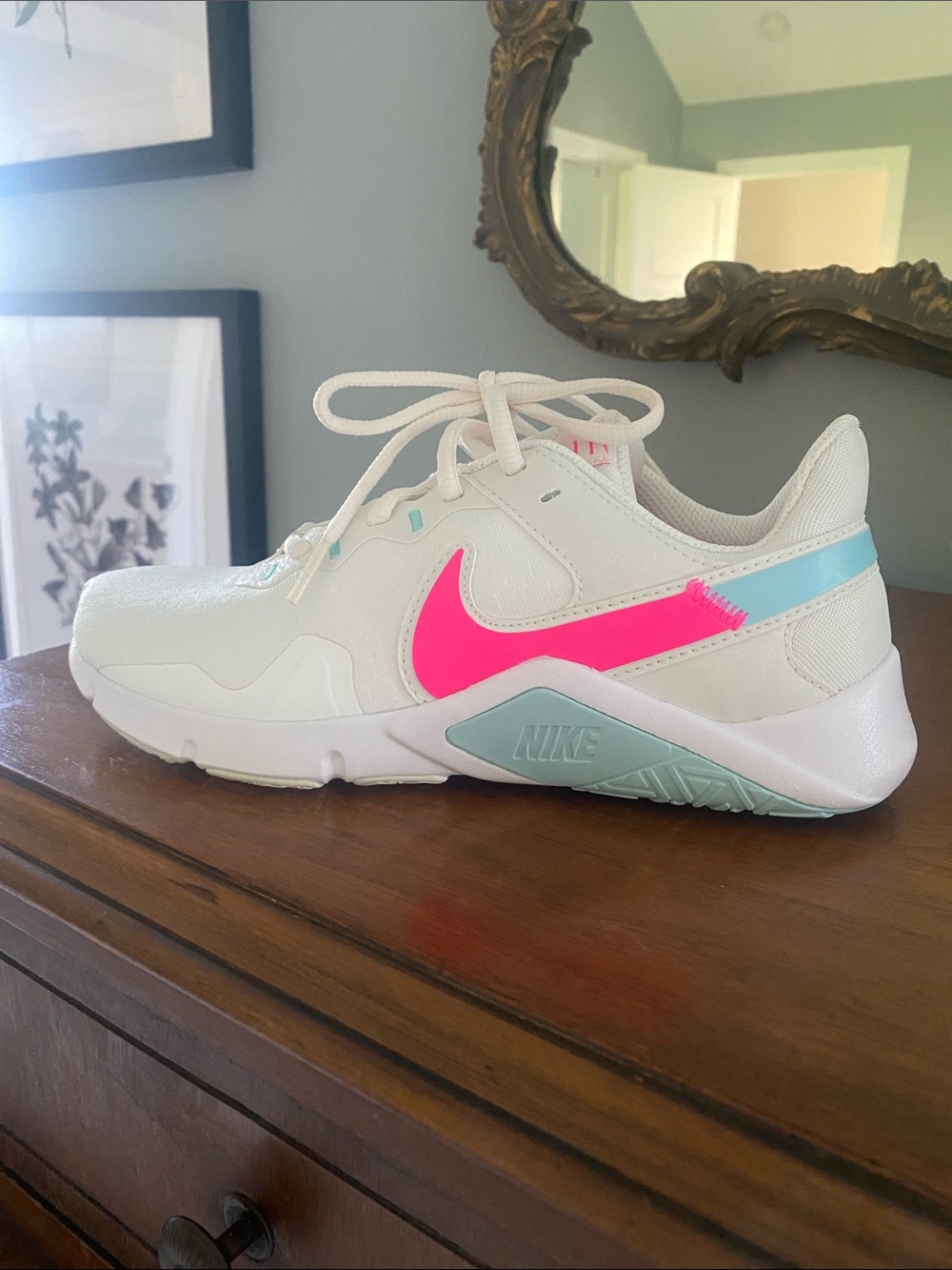 Nike White Athletic Sneakers with Hot Pink Swoosh and Light Blue Accents